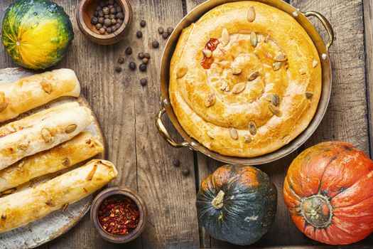 Moldovan pie made of yeast puff pastry.Pie with pumpkin.Placinta