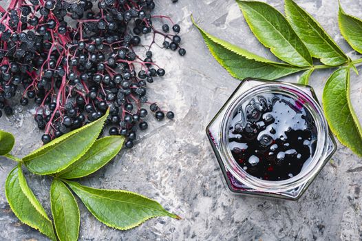 Elderberry jam and fresh berries.Homemade pozzy.Marmalade or confiture