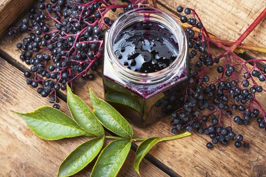 Elderberry jam and fresh berries.Homemade jam.Seasonal berries