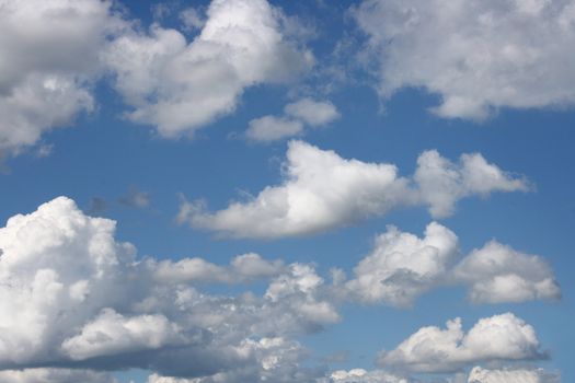 Big fluffy clouds (Altocumulus) with beautiful blue skies