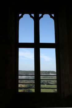 House wall with a window in the back light