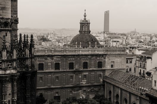 Old years style view of the central place from the Giralda tower in Sevilla, Spain