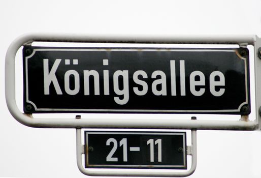 black road sign in Duesseldorf, Germany