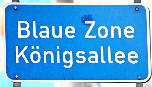 blue road sign in Duesseldorf, Germany