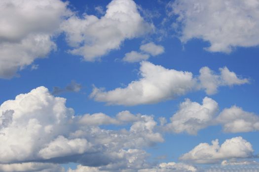 Big fluffy clouds (Altocumulus) with beautiful blue skies