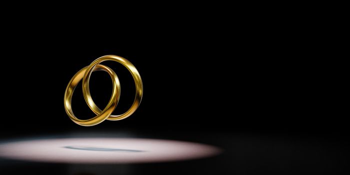 Two Golden Rings Chained Spotlighted on Black Background with Copy Space 3D Illustration