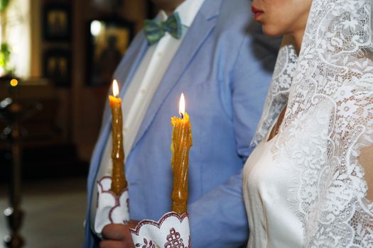 The beautiful wedding ceremony in the Russian Church. 