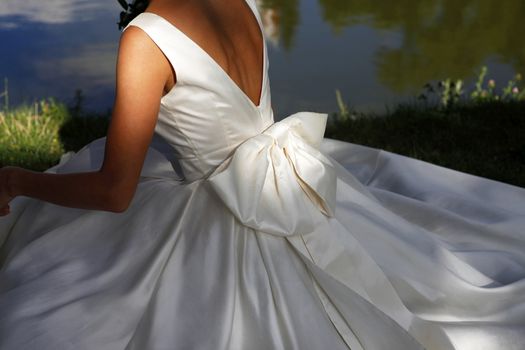 Backside of a beautiful dress of a bride
