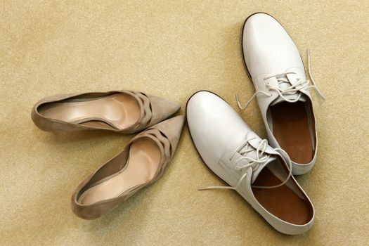 White shoes groom and beautiful bride's shoes