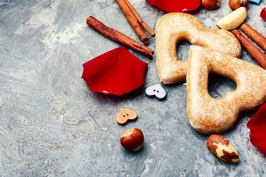 Baking heart shaped cookies for valentine day