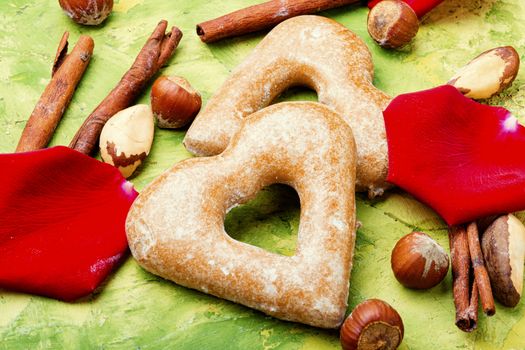 Baking heart shaped cookies for valentine day