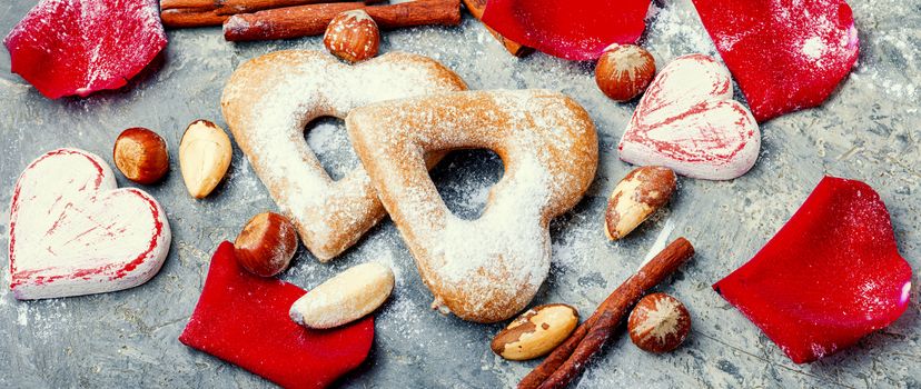 Baking heart shaped cookies for valentine day.Festive composition with cookies