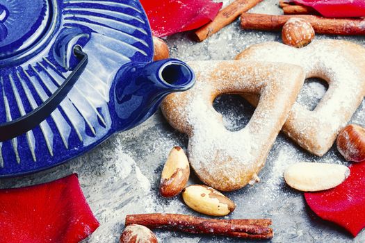 Baking heart shaped cookies for valentine day