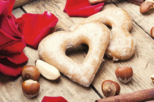 Heart shaped cookies for Valentine day on wooden background