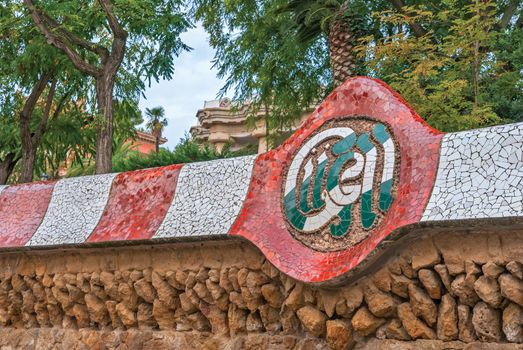 Colorful curving mosaic walls of Park Guell, Barcelona, Spain