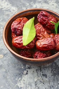 Bowl of dried unabi fruit or jujube.Medicinal and edible plant