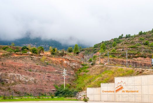 Stations of the funicular de Sant Joan and Cremallera train at the Benedictine abbey Santa Maria de Montserrat