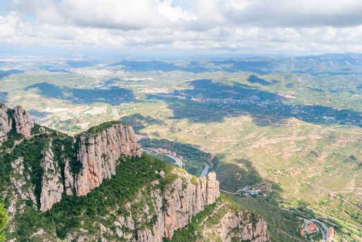 Breathtaking view to Montserrat mountain range on a sunny summer day near Barcelona, Catalonia, Spain