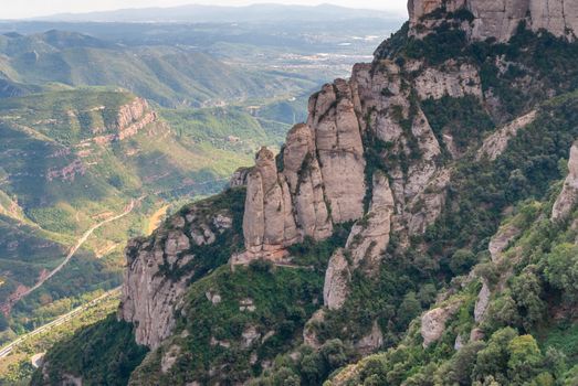 Breathtaking view to Montserrat mountain range on a sunny summer day near Barcelona, Catalonia, Spain