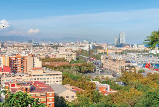 Panoramic aerial view of Barcelona in a beautiful summer day, Catalonia, Spain