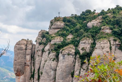 Montserrat is a mountain near Barcelona, in Catalonia. It is the site of a Benedictine abbey, Santa Maria de Montserrat, which hosts the Virgin of Montserrat sanctuary