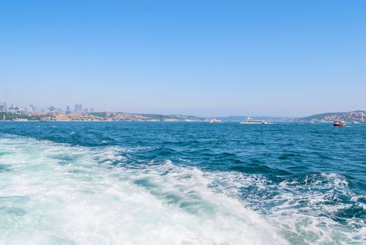 Passenger ferry ship carries people across the Bosphorus Strait along Istanbul, Turkey