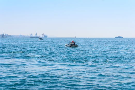 Passenger ferry ship carries people across the Bosphorus Strait along Istanbul, Turkey