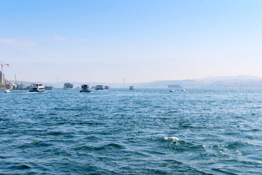 Passenger ferry ship carries people across the Bosphorus Strait along Istanbul, Turkey