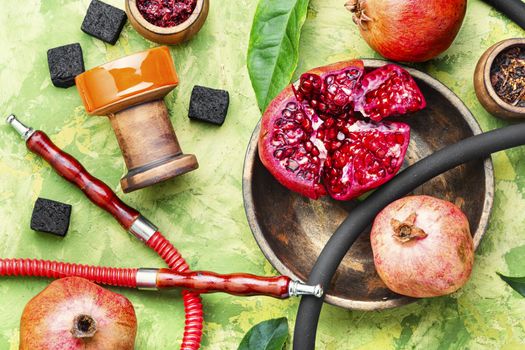 Arabic smoking hookah.Pomegranate flavor hookah.Fruit tobacco shisha