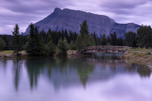 Panoramic image of early morning mood on Cascade Ponds with Mount Rundle in the background, Banff National Park, Alberta, Canada