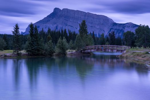 Panoramic image of early morning mood on Cascade Ponds with Mount Rundle in the background, Banff National Park, Alberta, Canada