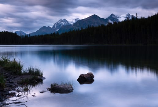 Daybreak at the beautiful Herbert Lake on a cloudy day, Icefield Parkway, Banff National Park, Alberta, Canada