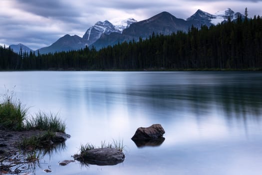 Daybreak at the beautiful Herbert Lake on a cloudy day, Icefield Parkway, Banff National Park, Alberta, Canada