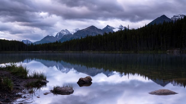 Daybreak at the beautiful Herbert Lake on a cloudy day, Icefield Parkway, Banff National Park, Alberta, Canada