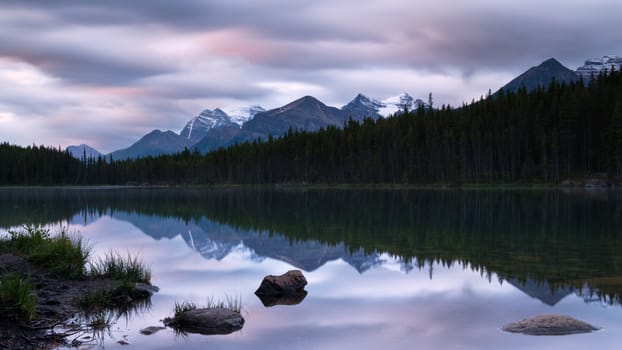 Daybreak at the beautiful Herbert Lake on a cloudy day, Icefield Parkway, Banff National Park, Alberta, Canada
