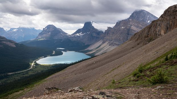 Panoramic image of the Bow Lake, surrounded bei mountain peaks of the Rocky Mountains, Banff National Park, Alberta, Canada