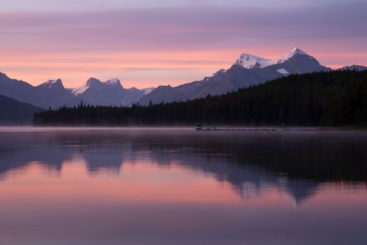 Long exposure panoramic image of the Maligne Lake close to Jasper with early morning mood, Alberta, Canada