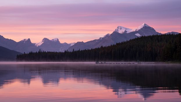 Long exposure panoramic image of the Maligne Lake close to Jasper with early morning mood, Alberta, Canada
