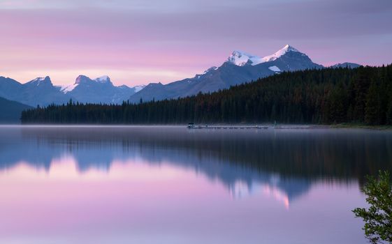 Long exposure panoramic image of the Maligne Lake close to Jasper with early morning mood, Alberta, Canada