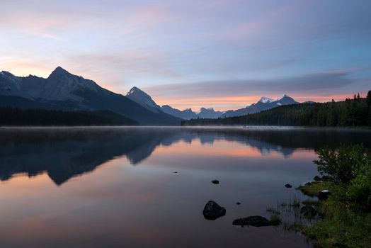 Long exposure panoramic image of the Maligne Lake close to Jasper with early morning mood, Alberta, Canada