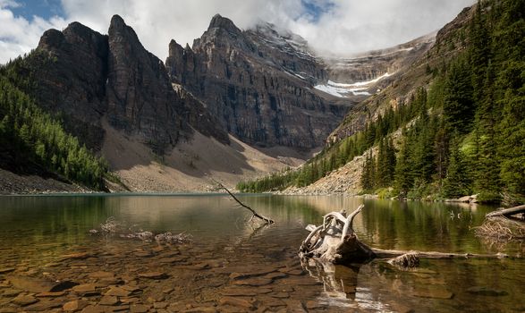Panoramic image of Lake Agnes, a quiet place surrounded by the Rocky Mountains close to Lake Louise, Banff National Park, Alberta, Canada