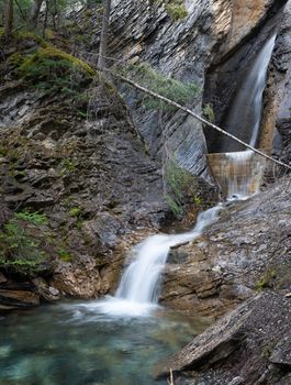 Long exposure image of an idyllic small waterfall within the Yoho National Park, British Columbia, Canada