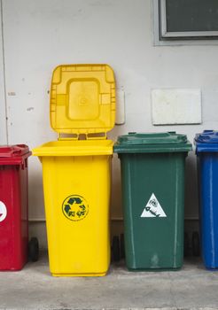 Garbage Trash Bins for collecting a recycle materials. Garbage trash bins for waste segregation. Separate waste collection food waste, plastic, paper and danger waste. Recycling. Environment