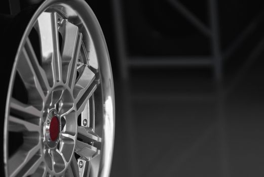 ar drives in the store with black background. Chrome car wheels for sale