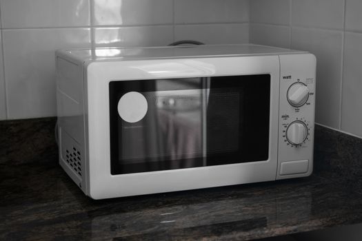 Microwave in a kitchen for cooking or heating a dish