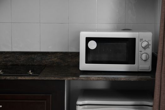 Microwave in a kitchen for cooking or heating a dish