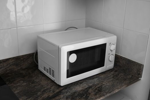 Microwave in a kitchen for cooking or heating a dish