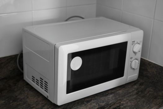 Microwave in a kitchen for cooking or heating a dish