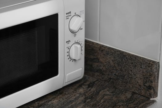 Microwave in a kitchen for cooking or heating a dish