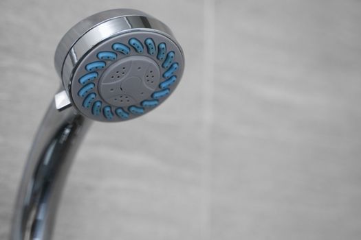 Modern shower head in modern bathroom. Shower head in bathroom with water spray or water flow. Feeling relax and enjoy in private bathroom. Fresh water flow from shower head for cleaning body dirty